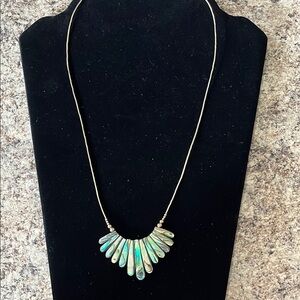 Elegant Gold Necklace with Blue Accents